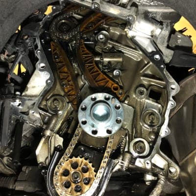 Close-up of timing components mid-repair